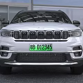White Jeep SUV With Green License Plate And Modern Exterior Design