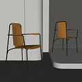 Modern Wooden Armchair With Black Metal Frame Armrest And Natural Wood Seat In Minimalist Room