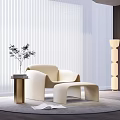 Modern Beige Leisure Chair With Side Table Potted Plant Floor Lamp Rug And Bright Interior