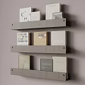 Modern Gray Floating Bookshelf with Decorative Books and Storage Boxes on Wall