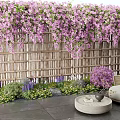 Purple Flowering Vines Decorating Bamboo Fence In Garden With Greenery And Seating