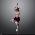 Woman Doing Yoga Single Leg Standing With Hands Raised In Pink Sports Bra Maroon Shorts