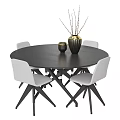 Modern Black Round Dining Table Set with Light Gray Chairs and Decorative Vase 3d model