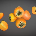 Several Ripe Fresh Orange Persimmons Whole And Sliced On Gray Background