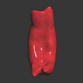 Red Human Organ Sculpture With Hairy Surface Displayed On Black Background