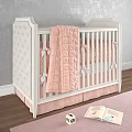White Baby Crib With Diamond Tufted Headboard Pastel Pink Quilted Blanket And Cozy Nursery Setting