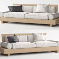 Modern Double Sofa With Wooden Frame White Cushions And Dark Throw Pillow