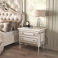 Elegant White Nightstand With Gold Accents Table Lamp Alarm Clock And Books In Classic Bedroom
