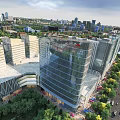 Modern Urban Planning Aerial View With High Rise Buildings Green Spaces And Road Networks