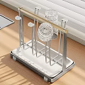 Stainless Steel Kitchen Decorative Storage Rack With Golden Rod And White Base On Wooden Countertop
