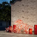 Outdoor Abstract Red Sculpture Carving Against Brick Wall With Trees And Modern Building