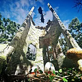 Cartoon Scene Featuring Tree Hollow Black Dragon Flying Colorful Eggs Mushrooms Green Trees Blue Sky