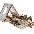 Outdoor Camping Table And Chair Set With Gray Triangular Tent And Decorative Plants