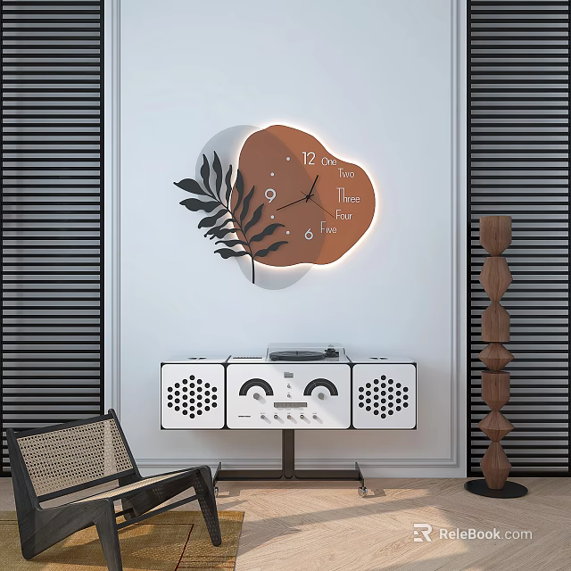 Decorative Wall Clock With Brown Dial Leaf Design Illuminated On White Wall Above White Speakers 3d model 