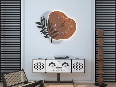 Decorative Wall Clock With Brown Dial Leaf Design Illuminated On White Wall Above White Speakers 3d model