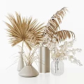 Decorative Vases in Various Shapes With Golden Palm Leaves Dried Leaves and White Flowers