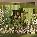 Floral Decoration Setup With Green Backdrop Gold Frame And Hanging Lantern Ornaments
