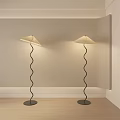 Two Curved Spiral Floor Lamps With Beige Shade In Room Corner Light Wall Wooden Floor