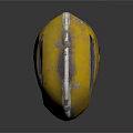 Worn Yellow Metal Weapon Helmet With Protective Design And Scratched Surface