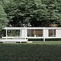 Modern White Single-family House With Large Glass Windows and Lush Green Trees