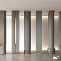 Modern Decorative Columns With Golden Accents And Textured Designs In Interior Space