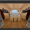 Wooden Interior Display Space With Hanging Black Bags And Glass Top Cases