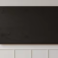 Modern Black Flat Screen Television Wall Mounted on White Wall with Wainscoting 3d model