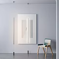Modern Floor Lamp In Contemporary Room With White Cabinet And Wooden Chair