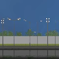 Outdoor Street Lights And Floodlights With Evening Sky Water Reflection And Trees