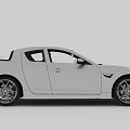 Silver Mazda Sports Car With Sleek Body Design And Black Alloy Wheels