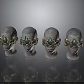 Four Human Head Models Wearing Gold And Green Mechanical Headgear On Reflective Surface