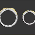 Two Silver Gold Decorative Rings With Textured Surface And Intricate Designs
