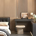 Modern Black Dressing Table With Table Lamp Flower Arrangement And Stool In Bedroom
