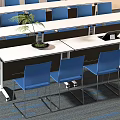 White Conference Table With Blue Chairs And Potted Plant In Modern Office Meeting Room
