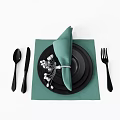Dinnerware Set With Green Napkin Black Cutlery Stacked Plates Decorative Flower On Green Placemat