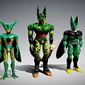 Three Green Character Action Figures With Spotted Patterns And Varied Poses