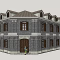 Historic Commercial Complex With Gray Brick Walls Brown Roof And Arched Windows