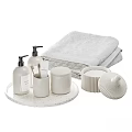 Minimalist White Laundry Essentials Including Towels Hand Wash Bottles And Lidded Containers