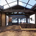 Traditional Chinese Ancient Interior With Blue Calligraphy Banners Wooden Beams And Stone Tables