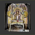 Exquisite Seated Buddha Stone Sculpture Carved in Cave with Floral Motifs and Vibrant Colors
