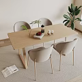 Modern Light Wood Table And Chair Set With Gray Seats And Plant On Rug