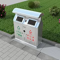 Roadside Dual Compartment Trash Bin On Paved Sidewalk With Green Lawn And Flowers