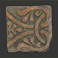 Ancient Decorative Brick With Colorful Red Green Curved Lines And Leaf Motifs