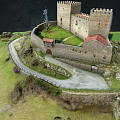 Medieval Castle Architecture With Stone Walls Towers On Green Hill And Path