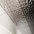 Textured Metallic Wall Decor With Geometric Patterns And Colorful Round Accents