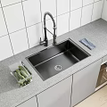 Stainless Steel Kitchen Sink with Flexible Faucet Grey Countertop Cucumber Container and Light Grey Cabinets
