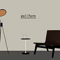 Poliform Single Sofa With Floor Lamp Small Round Table And Light Colored Wall 3d model