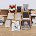 Books Magazines Stacked Collection With Various Covers And Different Themes On Wooden Floor