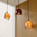 Modern Dome Shaped Pendant Lights Orange And Brown Hanging Over Wooden Wall With Window Blinds