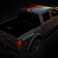 Ford Pickup Truck With Rugged Exterior Design And Off Road Tires In Dark Finish